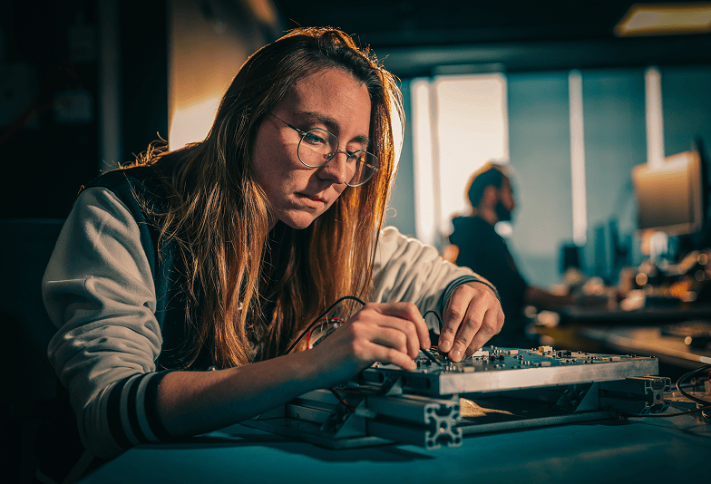 levelupgroup_a_close-up_shot_of_an_electricians_hands_and_his_f_da40d066-e16e-4b29-8c1d-638357a01c9a 1